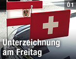 Österreichische und Schweizer Flagge
