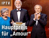 Michael Haneke mit Filmmanschaft
