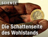 Hand mit Eurom&uuml;nze