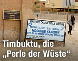 Schild vor Denkmal