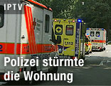 Polizeiautos und Rettungswagen