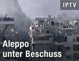 Rauch über Gebäude in Aleppo