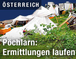 Herabgestürzte Äste liegen auf Zelt