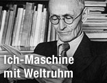 Hermann Hesse in einem Buch lesend