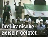 Standbild aus einer angeblichen Videoaufnahme syrischer Rebellen und ihren Geiseln