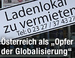 Gesch&auml;ft mit Schild "Lokal zu vermieten"