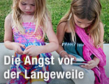 Kinder mit Smartphones