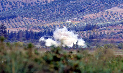 © Reuters/Anadolu Agency Aufsteigender Rauch auf türkischem Boden bei der Grenze zu Syrien