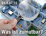 Lupe &uuml;ber einem Wohnungsplan