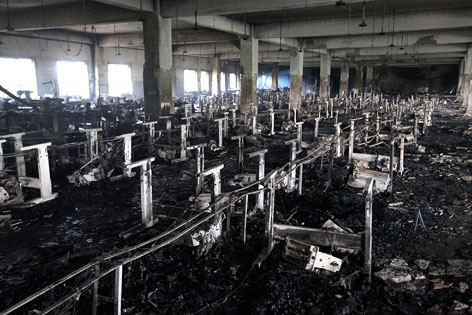 © APA/EPA/Abir Abdullah Zerstörte Textilfabrik