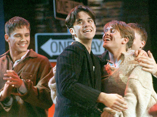 © APA/EPA/Stefan Rosseau Jason Orange, Robbie Williams und Mark Owen aus der Band "Take That"