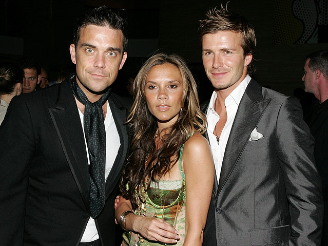 © AP/Frazer Harrison Robbie Williams, Victoria Beckham und David Beckham