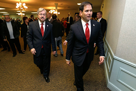 © AP/Charlie Neibergall U.S. Senator Marco Rubio, und Iowa
Gouverneur Terry Branstad