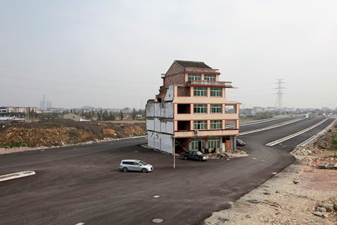 © Reuters/Aly Song Haus auf Schnellstraße in China