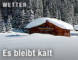 Verschneite Hütte