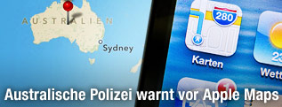 Der Bildschirm eines Apple iPhone zeigt das Icon der Karten-App von Apple