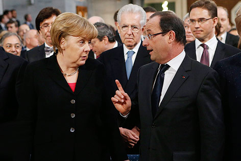 © APA/EPA/Stian Lysberg Die deutsche Bundeskanzlerin Angela Merkel (CDU) und der französische Staatschef Francois Hollande