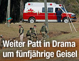 Rettungswagen und Sicherheitsleute am Ort des Geschehens