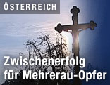 Kirchenkreuz im Gegenlicht