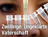 Laborantin mit einem DNA-Test
