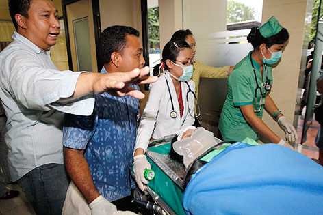 © APA/EPA/Made Nagi Menschen im Krankenhaus