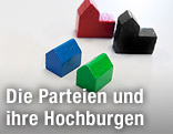 Sujetdarstellung der Parteien SP&Ouml;, &Ouml;VP, FP&Ouml; und Gr&uuml;ne mit farbigen Holzbausteinen