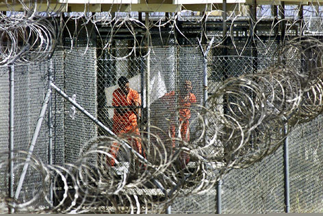 © APA(EPA/J. Scott Applewhite Gefangene hinter Gittern