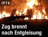 Mit Chemikalien beladener Zug brennt