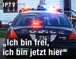 Polizeiauto vor dem Haus
