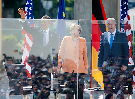 © Reuters/Fabrizio Bensch US-Präsident Barack Obama, die deutsche Kanzlerin Angela Merkel und Berlins Bürgermeister Klaus Wowereit