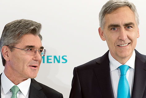 © APA/dpa/Peter Kneffel Vorstandsvorsitzender der Siemens AG, Peter Löscher und Siemens-Finanzchef Joe Kaeser
