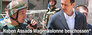 Der syrische Pr&auml;sident Baschar Al-Assad Assad mit Soldaten