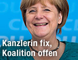 L&auml;chelnde deutsche Kanzlerin Angela Merkel