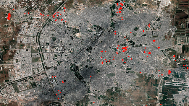 © APA/EPA/Atrium/Digital Globe/Amensty International Luftaufnahme mit Einschlagsstellen der Bomben