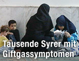 Frauen und Kinder in einem Krankenhaus