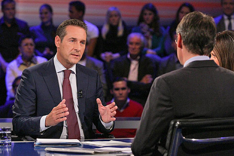 © ORF/Milenko Badzic Heinz-Christian Strach (FPÖ) und Josef Bucher (BZÖ) im ORF-TV-Duell