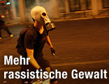 Demonstrant mit Gasmaske