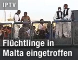 Boot der Marine mit Flüchtlingen an Bord