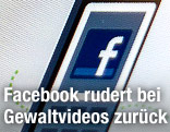Geöffnete Facebook-Seite auf einem Monitor