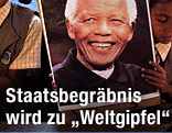 Mädchen mit Mandelas Bild in der Hand