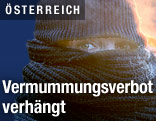 Vermummte Person in eisiger K&auml;lte