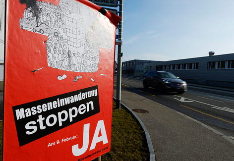 © APA/EPA/Steffen Schmidt Ein Plakat gegen die Masseneinwanderung in der Schweiz
