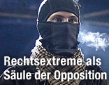 Maskierter Mann