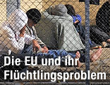 Migranten in griechischem Fl&uuml;chtlingscamp