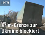 Lastwagen blockieren die Krim-Grenze zur Ukraine