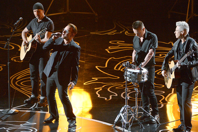 Bono, Larry Mullen, Jr. und Adam Clayton von U2
