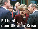 Gro&szlig;britanniens Premierminister David Cameron, die deutsche Bundeskanzlerin Angela Merkel und Rum&auml;niens Pr&auml;sident Traian Basescu auf dem EU-Gipfel