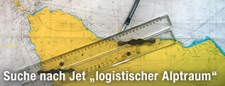 Stift und Lineal auf Landkarte