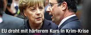 Deutsche Kanzlerin Angela Merkel und der französische Präsident Francois Hollande