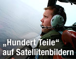 Fluzeugpilot sucht Flugzeugteile im Indischen Ozean